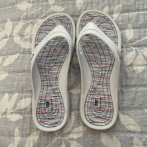 White Tex Gear sandals.